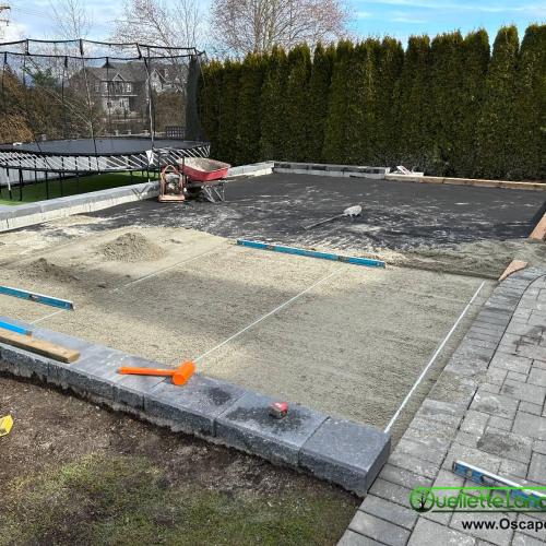  | We installed a nice raised area for a trampoline and some retaining walls to level out an area for a basketball court | Putting Greens & Sports Field Installations 